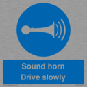sound-horn-drive-slowly-warehousing-and-delivery-sign~